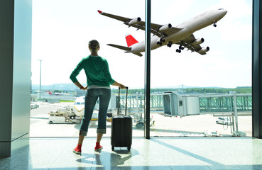 Girl at the airport window