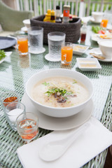 Traditional porridge rice gruel in bowl