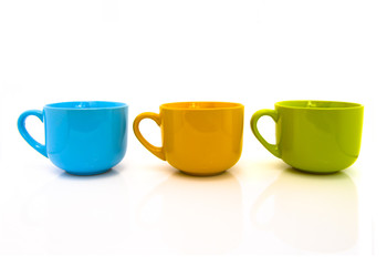 colorful cups isolated on white background.