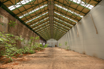 Abandoned industrial interior with bright light