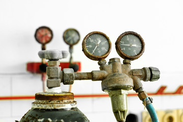 Old industrial gauge closeup photo