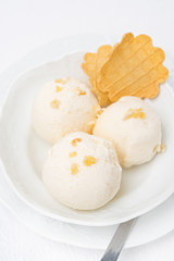 Ginger ice cream with melted milk and waffles