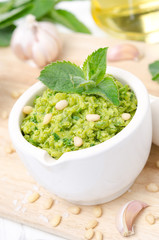 pesto with green peas with mint and pine nuts, vertical