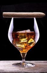 Cognac and Cigar on black