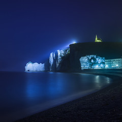 Etretat cliff and church. Night photo. Normandy, France.