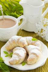 Homemade mini croissants with cream cheese.