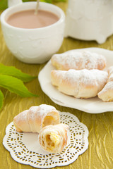 Homemade mini croissants with cream cheese.