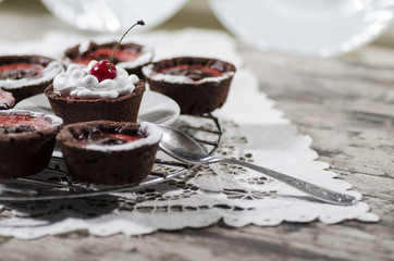 Chocolate desserts decorated cherry served with a spoon