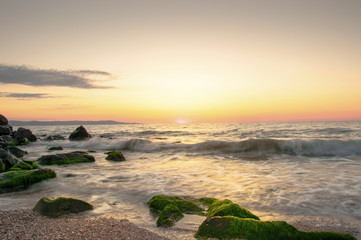 Obraz na płótnie Canvas Beatiful sunset on the rocks