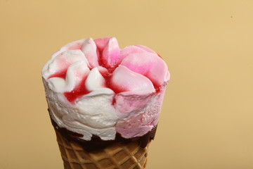 Berry icecream waffle cone on orange