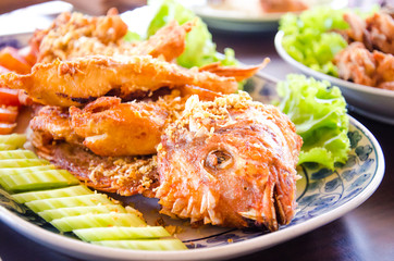 Deep-fried Ruby fish with garlic.