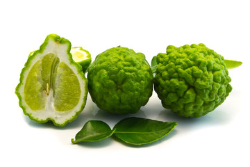 Bergamot. cut half-and-half on white .