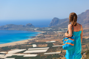 woman looking over beach on Crete