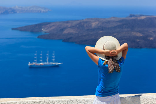 Woman Enjoying View Of Santorini, Greece