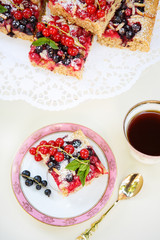 Fresh baked red and black currant berries cake