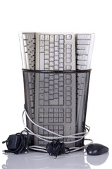Full trash of used computer keyboards and cables