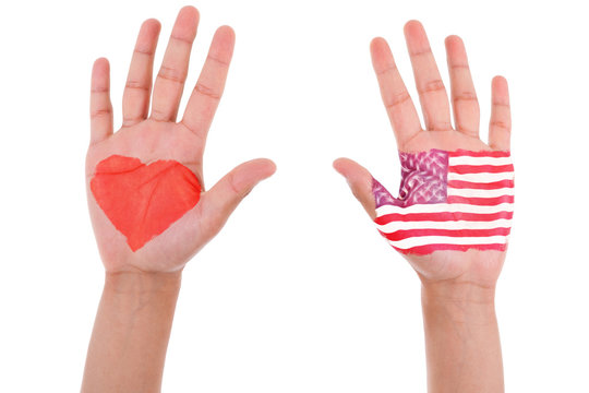 Hands with a painted heart and united states flag, i love usa co