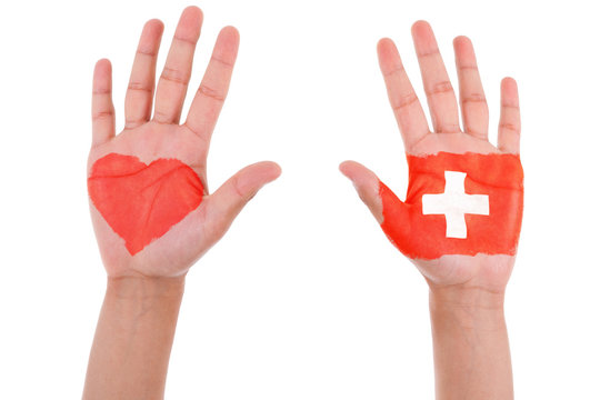 Hands with a painted heart and swiss flag, i love switzerland co