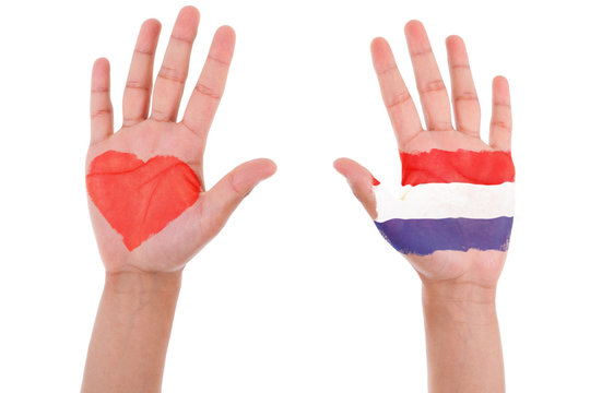 Hands with a painted heart and Netherland flag, i love Netherlan
