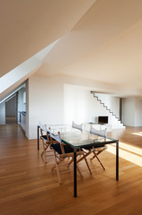 Interior, wide loft, hardwood floor, view dining table