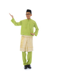 Traditonal Malay man with welcome gesture during ramadan isolate