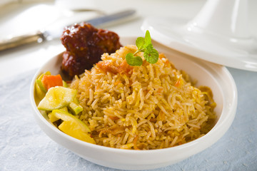 Biryani chicken rice cooked in arab style tajine with traditiona