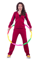 Woman doing exercises with hula hoop