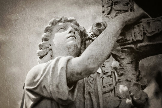 boy holding cross tombstone - textured