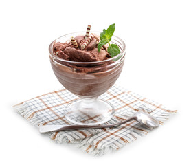 Chocolate ice cream with mint on a white background