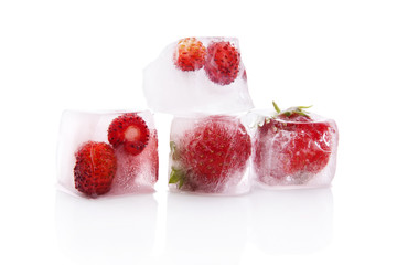 Frozen strawberries in ice cubes.