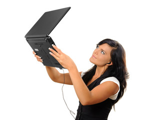 Young woman with laptop and earphones. - obrazy, fototapety, plakaty