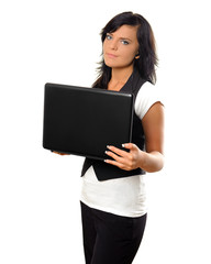 Young woman with laptop and earphones.