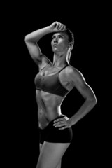 Fototapeta na wymiar woman atlethe showing her figure