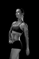 Obraz na płótnie Canvas woman atlethe showing her figure