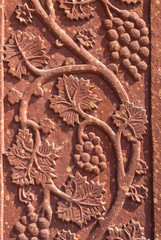 Mural sculpture of grape vines in red sandstone at Fatehpur Sik