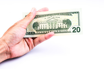 Hand with dollars on white background concept