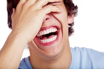 Fotobehang Laughing guy closeup © Sergey Furtaev