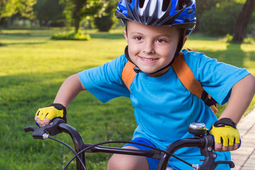 Little boy riding a bike