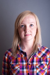 Studio portrait of freckled blonde