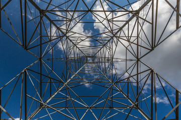 high voltage electricity pylon and the sky