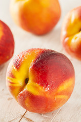 Fototapeta na wymiar Organic Ripe Orange Peaches