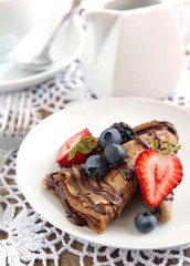 Chocolate crepes with fresh berries