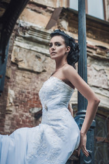 Fototapeta premium Portrait of beautiful bride. Wedding dress. Vintage decoration