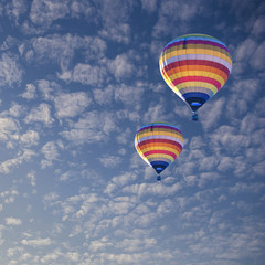 Fototapeta premium Hot air balloon on cloud