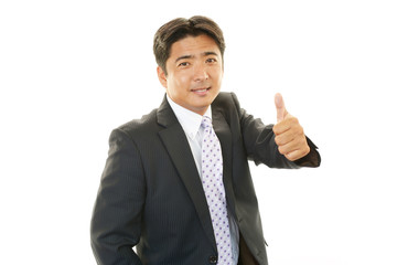 ガッツポーズのビジネスマン