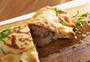 Qutab- baked Chebureki