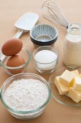 Baking ingredients with utensils.