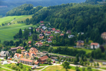 Fototapeta na wymiar View Kurort Rathen. Saxon Switzerland. Tilt-shift lens.
