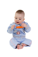 Child looks at the flying carrot