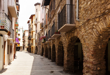 picturesque street of old Catalan town - obrazy, fototapety, plakaty